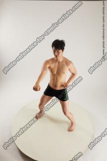 asian man taekwondo poses lan 02a